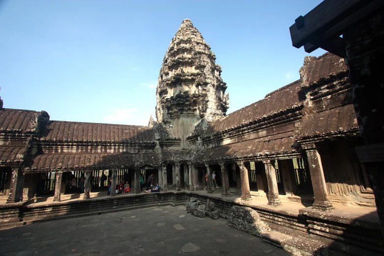 a huge ornate and old building with a statue