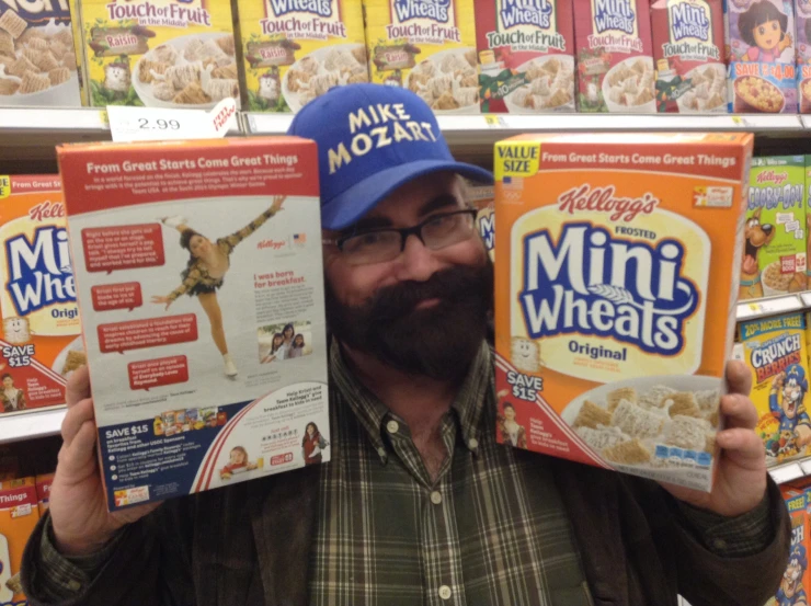 a man holding three packages of cereal