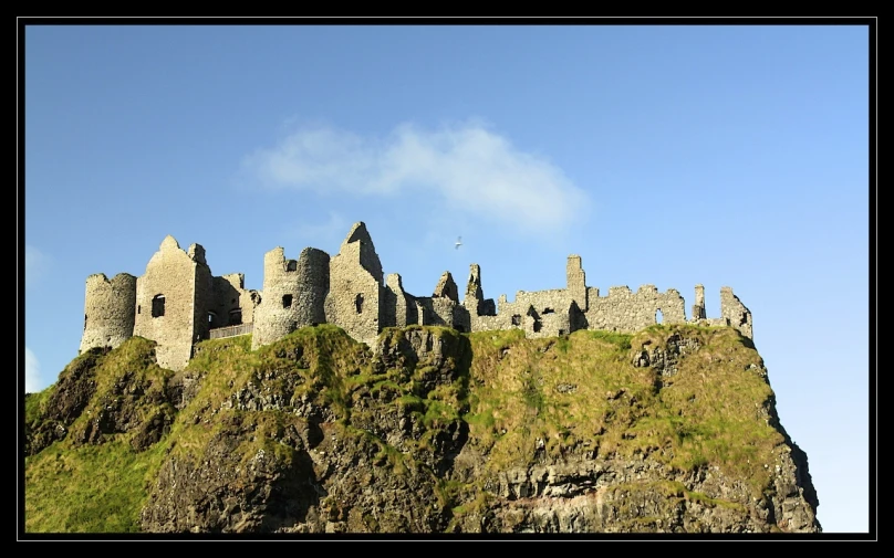 a big mountain with a castle on top