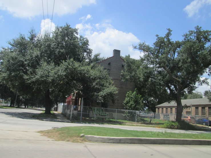 an old building on the side of the road