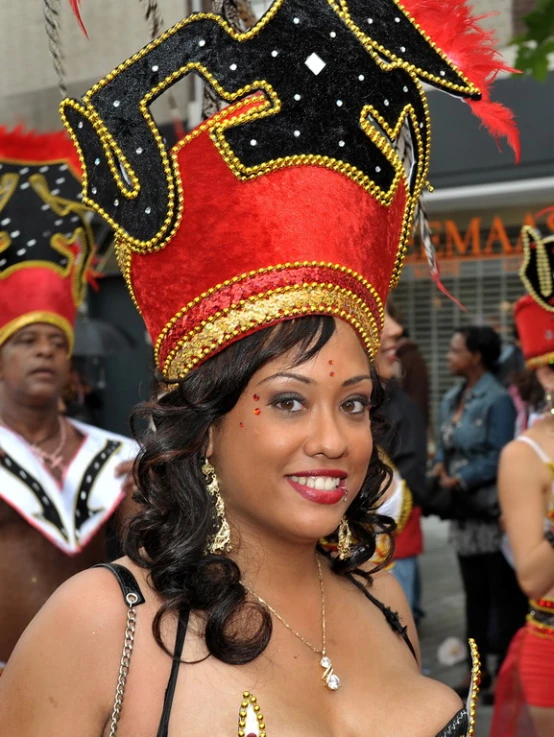 a woman wearing a black and red costume