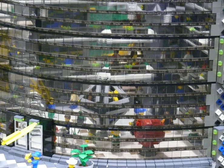 a building made up of legos, and another building with windows