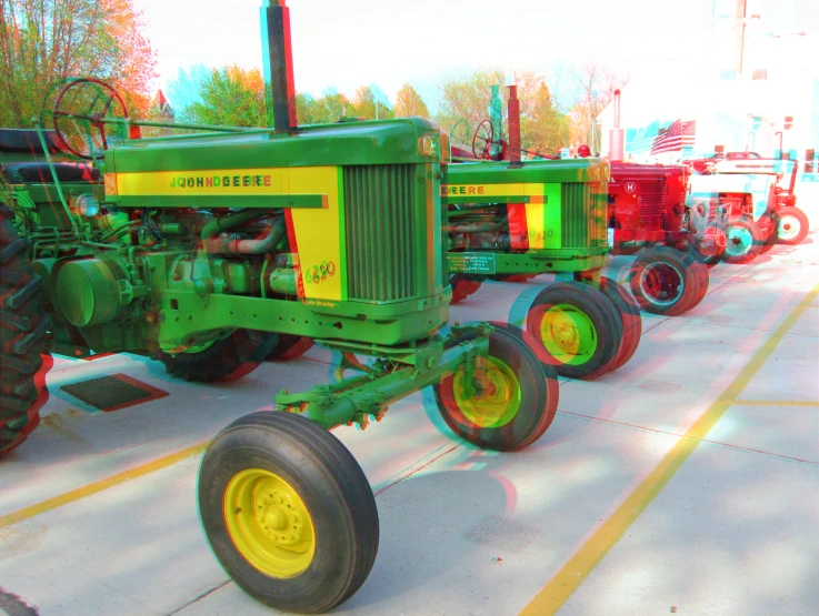 an array of tractors lined up along a street