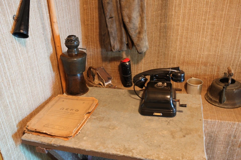 an old sewing machine and other items on a table