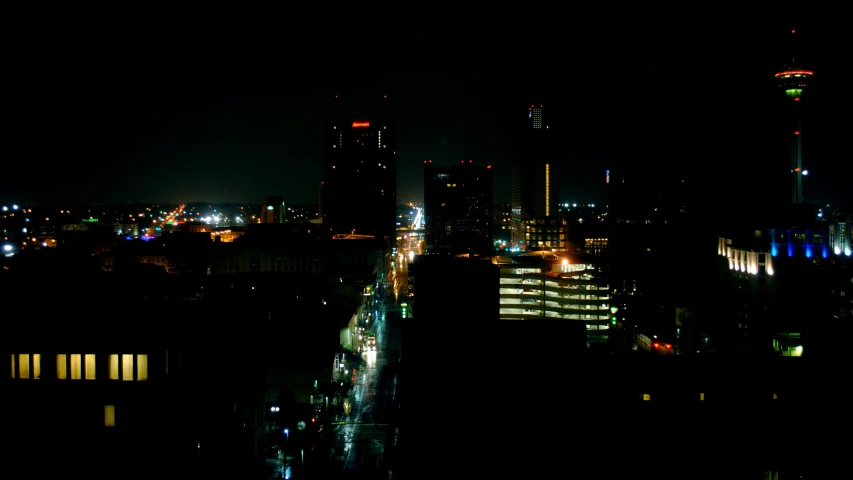 night time city with street lights and buildings