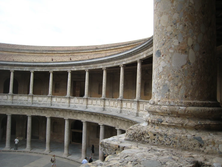 an ancient architecture with marble pillars and columns