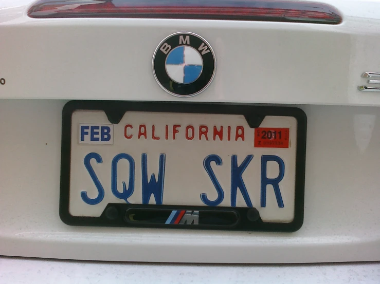 a license plate that has been printed with the word slow skr