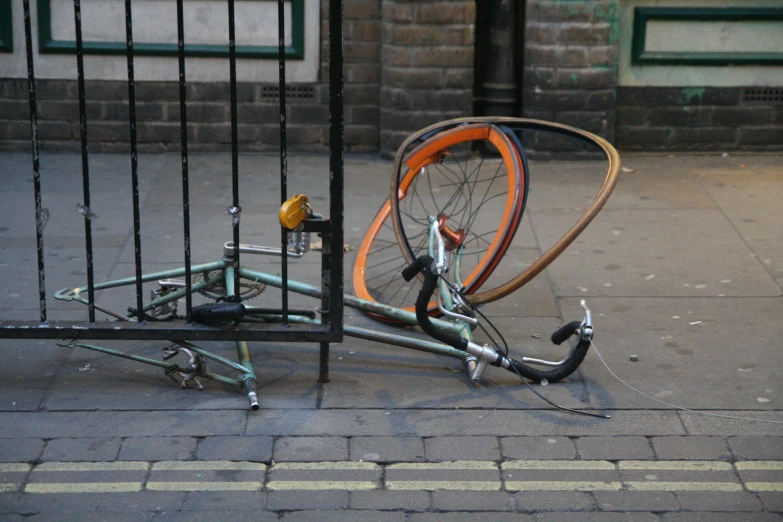 the bike has been locked to its stand by a metal rod