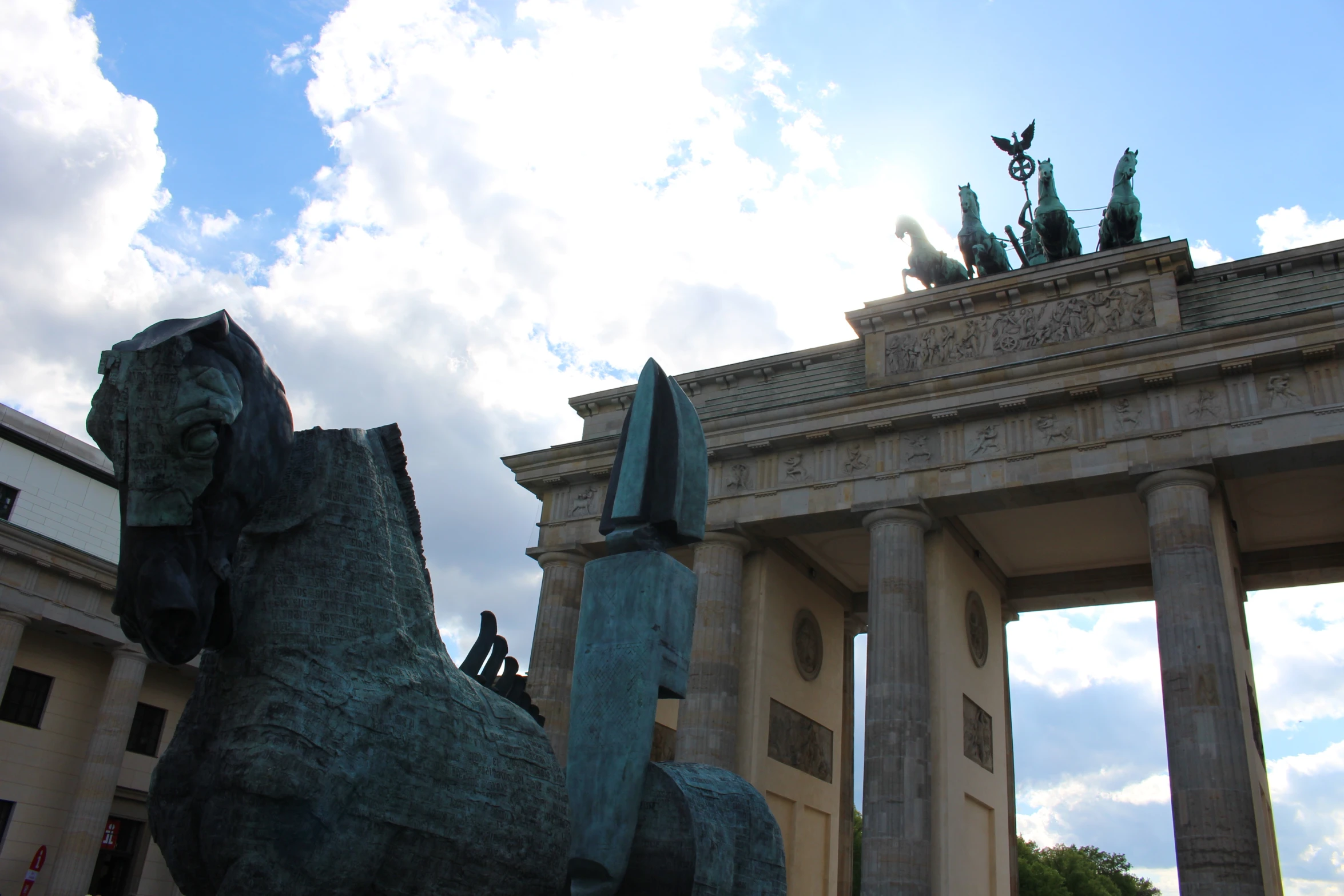 a po of an equestrian statue in front of some pillars