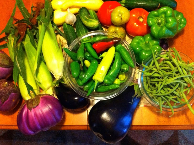 some bowls of various vegetables on a table