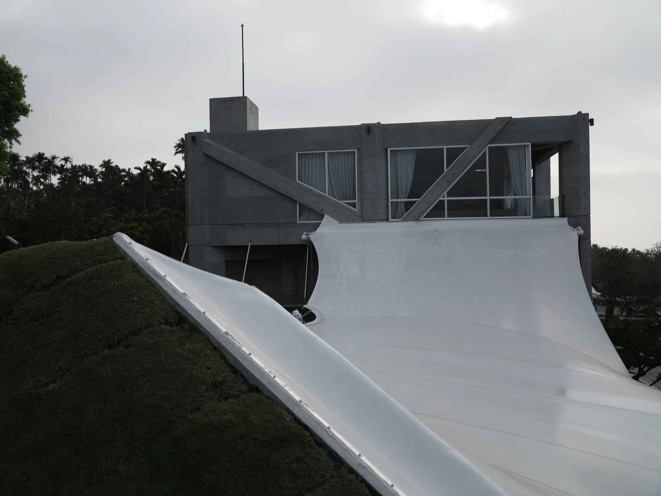 an airy home with a skateboard ramp and fenced in area