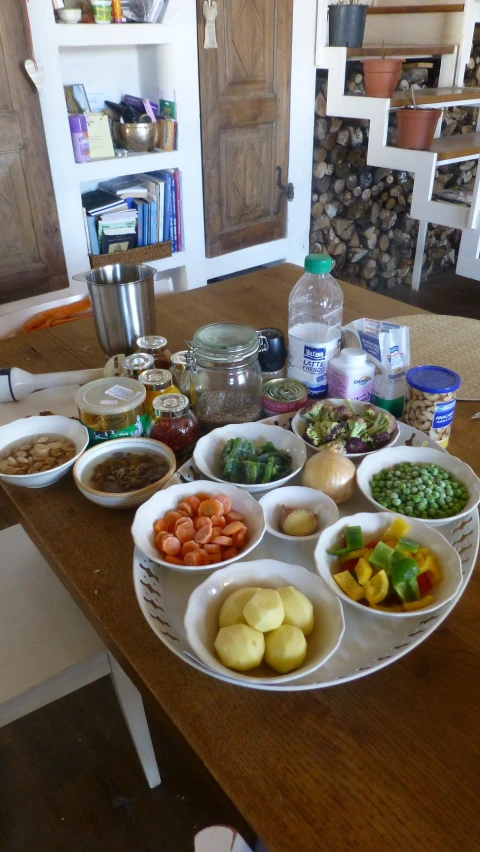 this is a full view of some bowls and plates