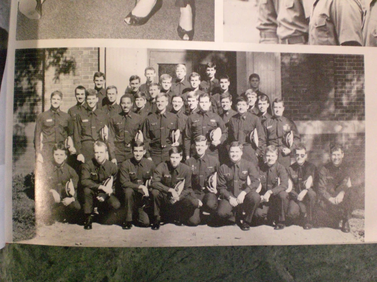 an old po of the army personnel posing for a picture
