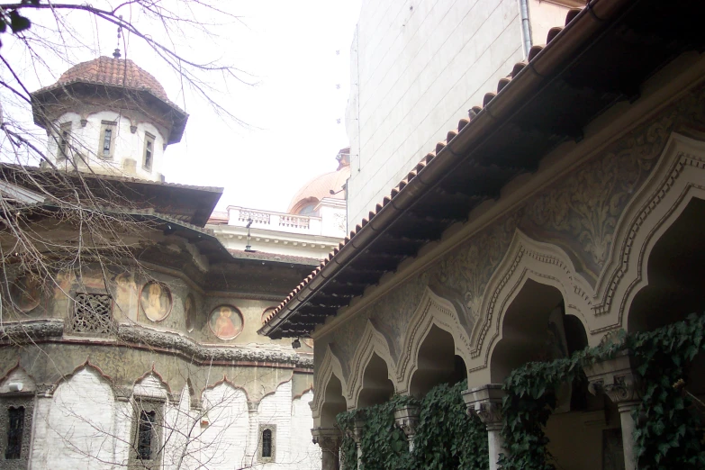 the front and side of an elaborately decorated house