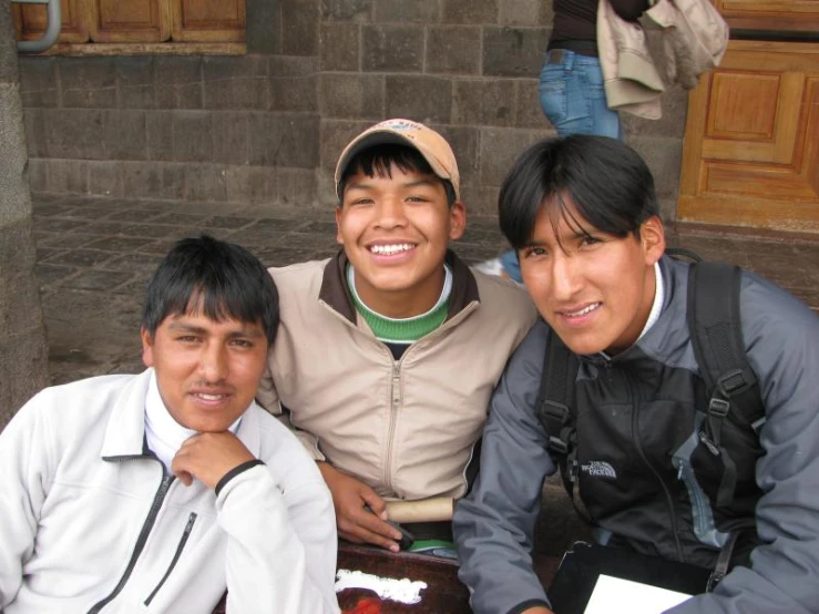 a group of men standing next to each other