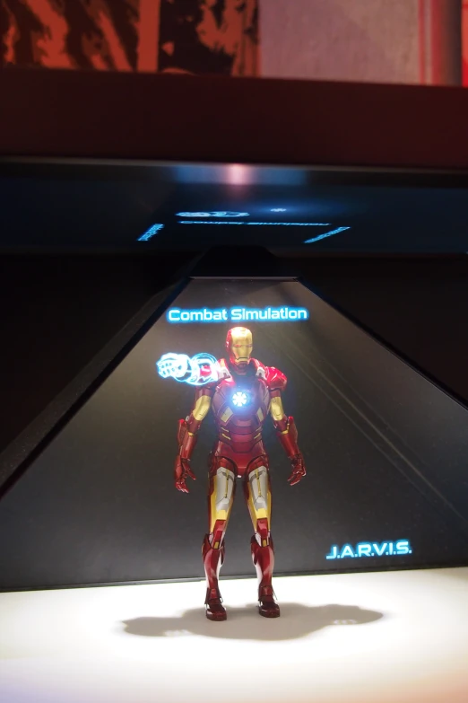 a toy iron man stands on a white surface with lights