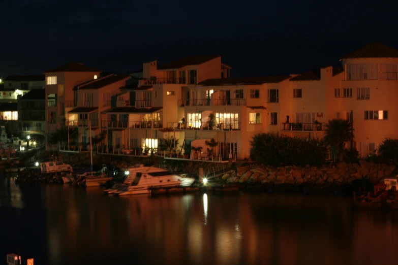 a marina in a city at night