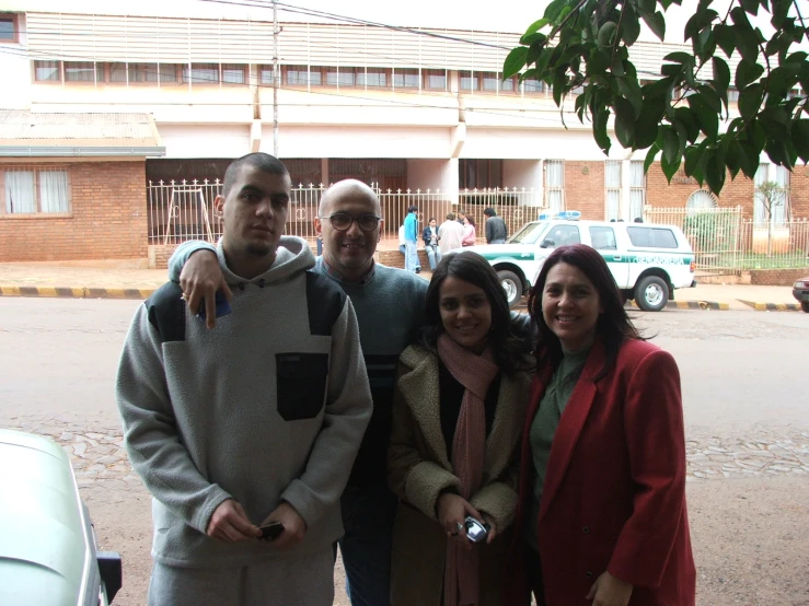 a group of people standing next to each other