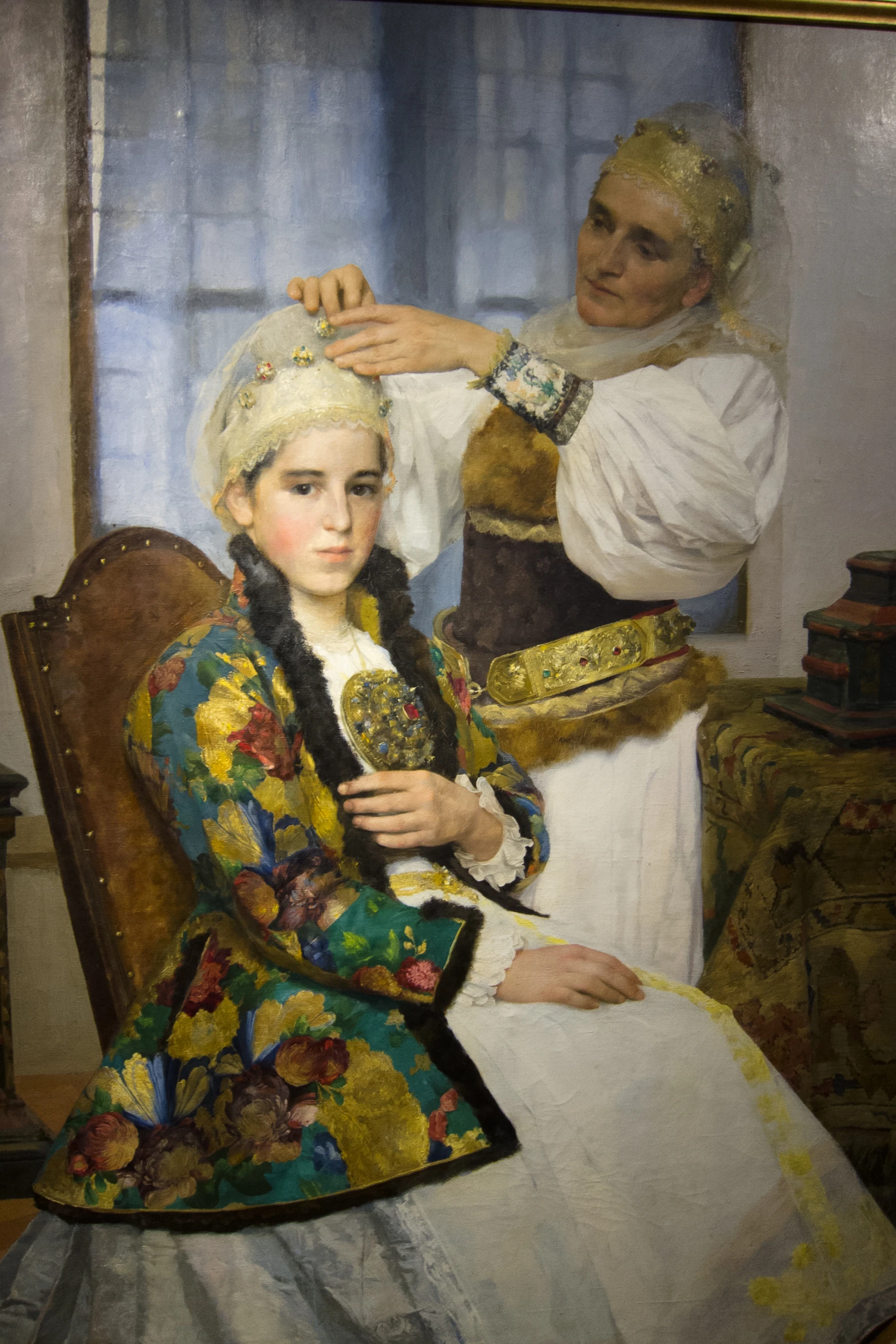 a painting of an older woman getting her hair done