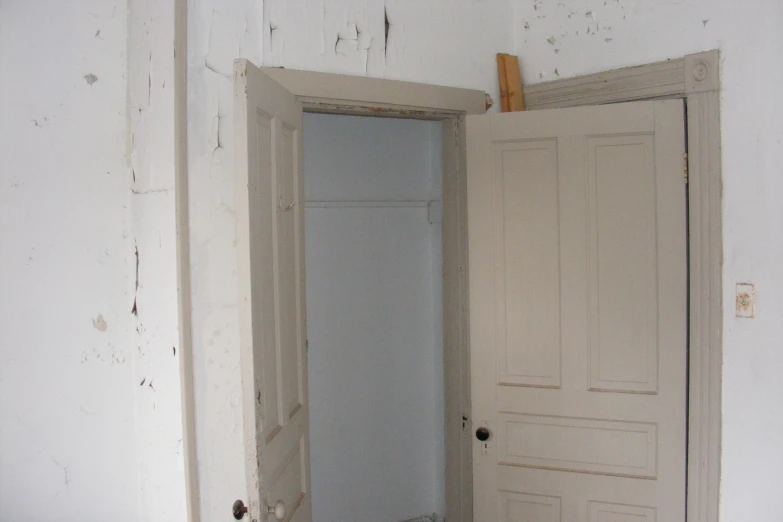 an open doorway to a bedroom with a toilet