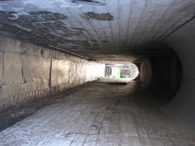 a tunnel with a bench inside on either side