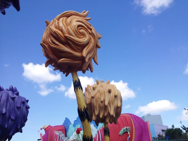 a big sculpture with a bunch of flowers in the middle