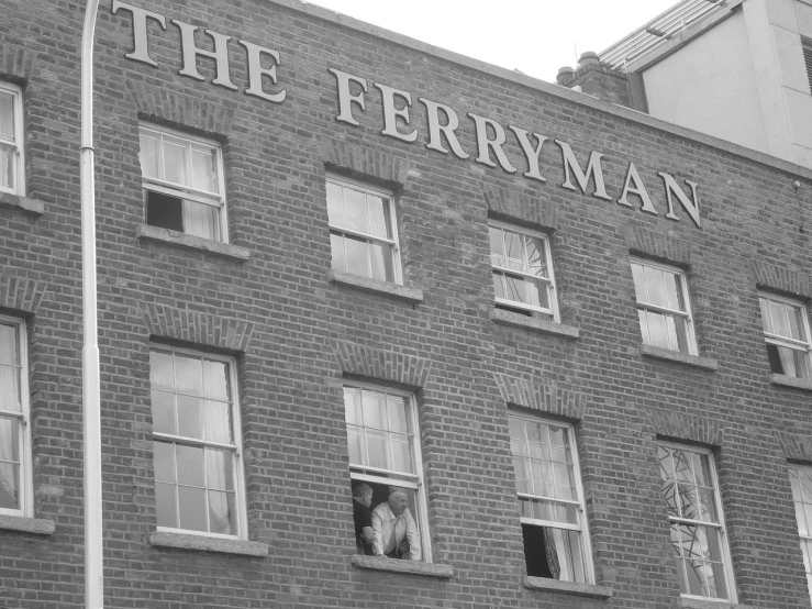 a large brick building with a few windows