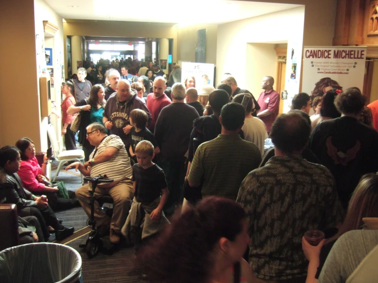 a group of people gathered at the entrance of a building