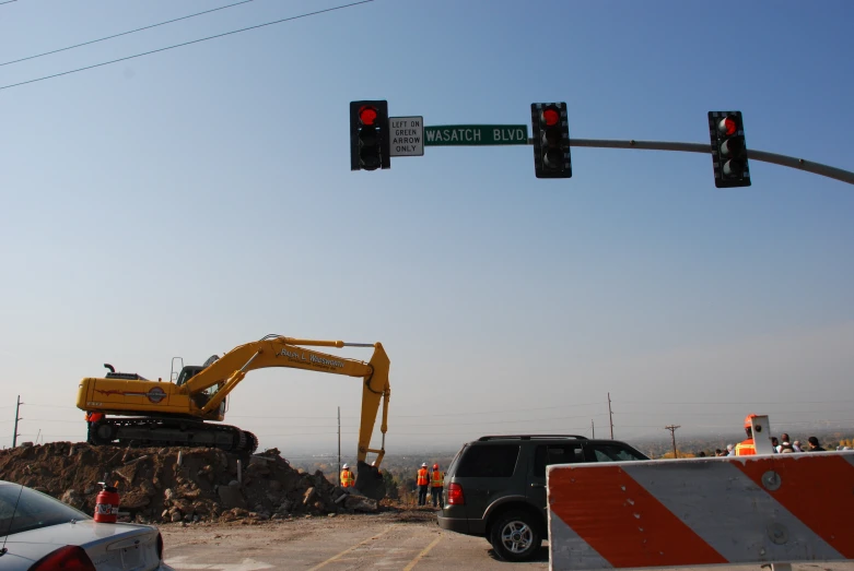 construction equipment is at the construction site for the intersection