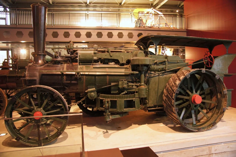 an antique steam engine on display in a museum