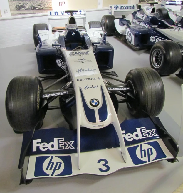 a racing car on display in a shop