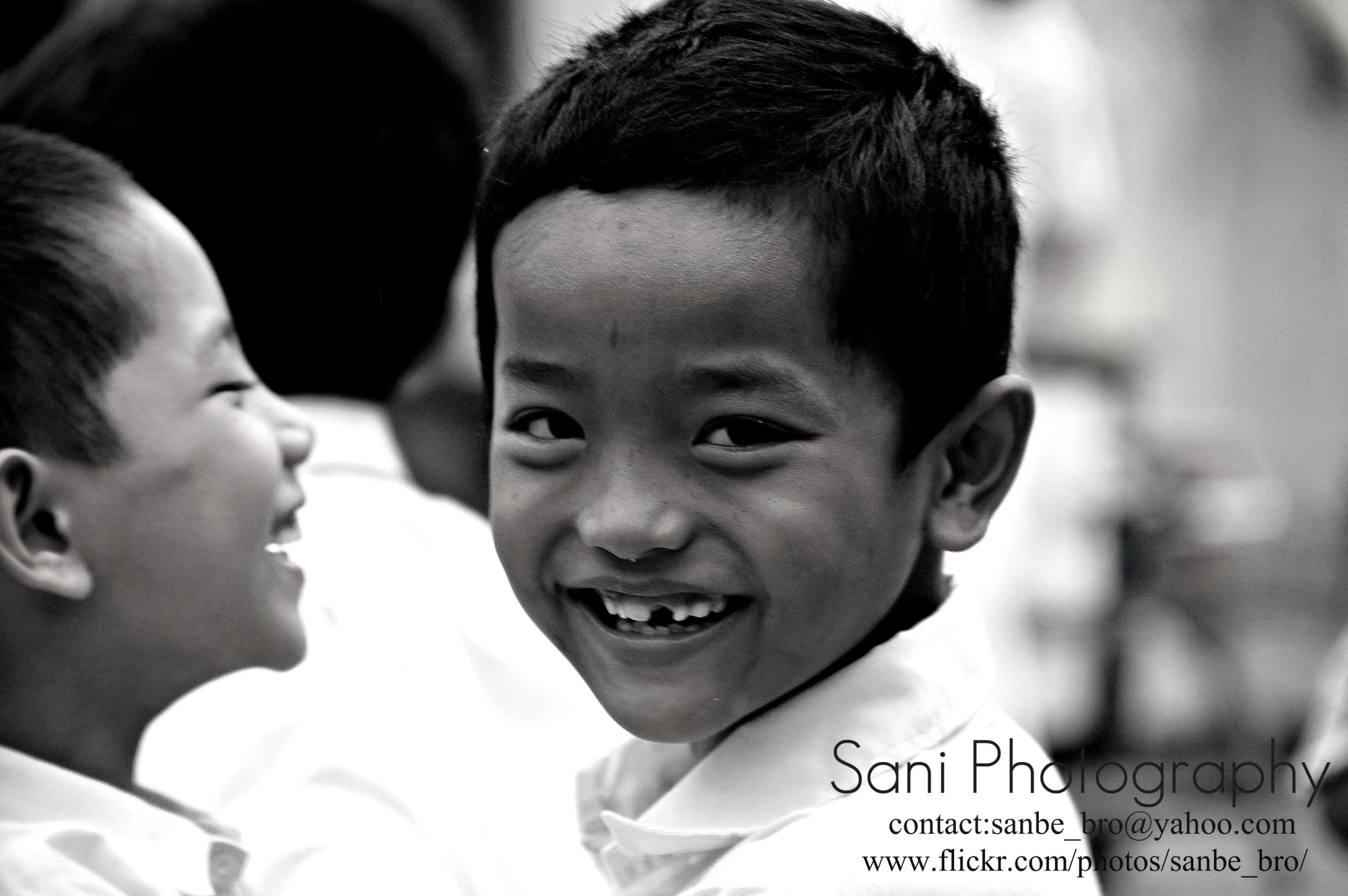 a  and girl laughing close together