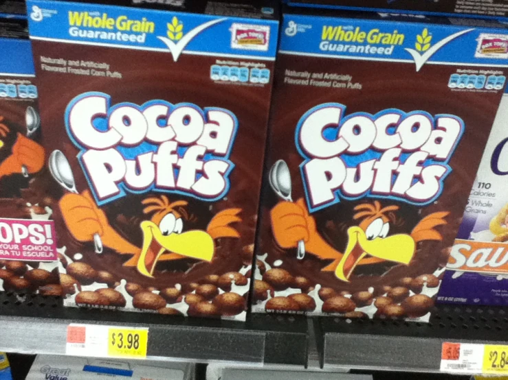 chocolate puffs are sitting on the shelves at a supermarket
