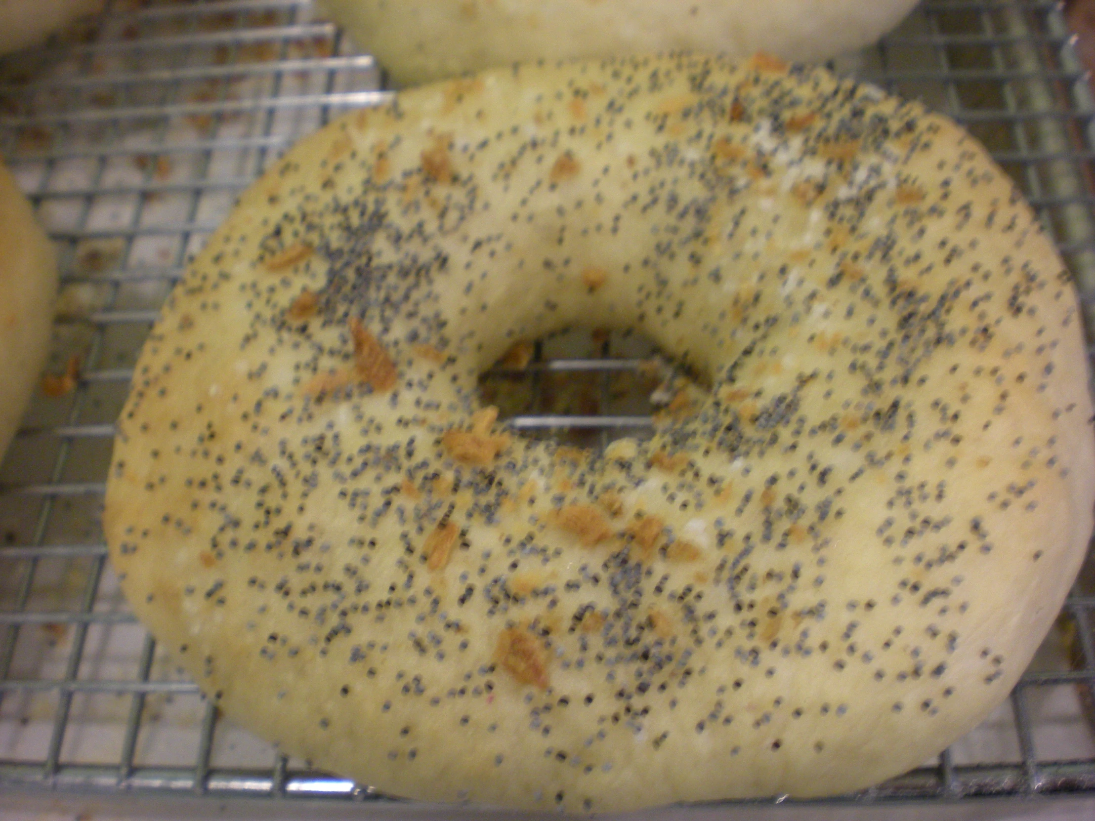 a couple of doughnuts sitting on top of a cooling rack