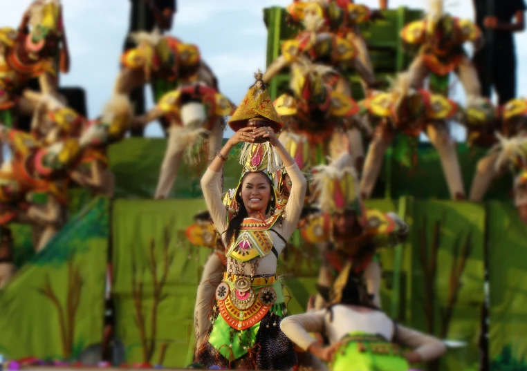 a woman in some fancy costume at a festival