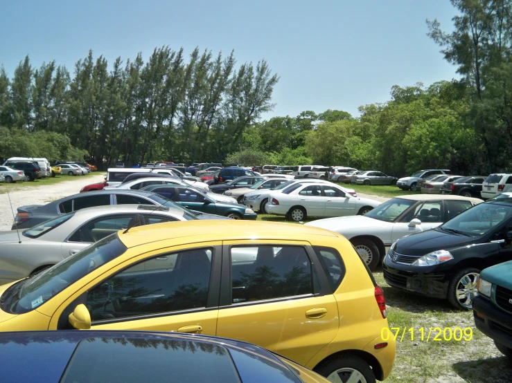 cars in a parking lot next to each other