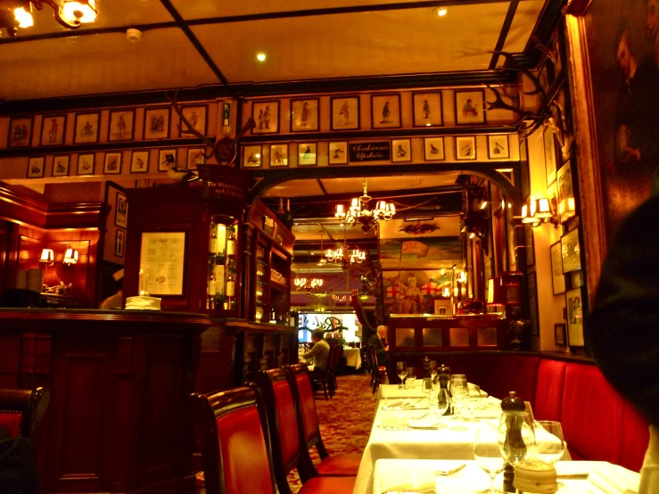 a dining area in a large restaurant with no one in it