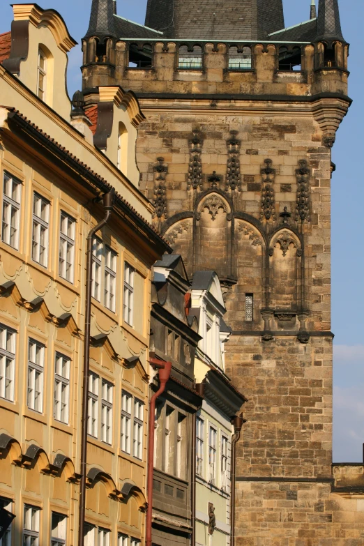 a clock tower behind an old building