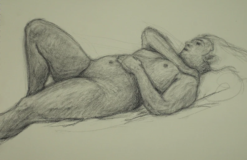 a sketched drawing of a  woman laying on a bed