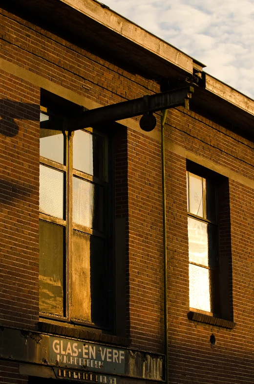 the old fire station sign shows its age and location