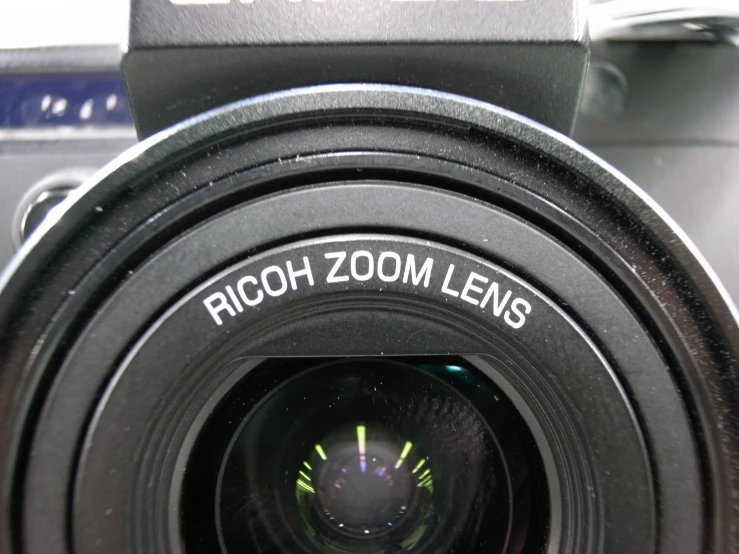 a close up view of the zoom lens on an electronic device