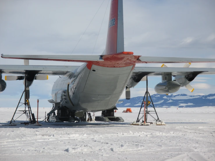 the nose of an airplane with a rope around it