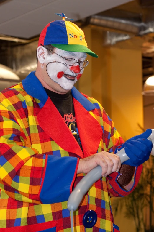 an older man is dressed up as a clown