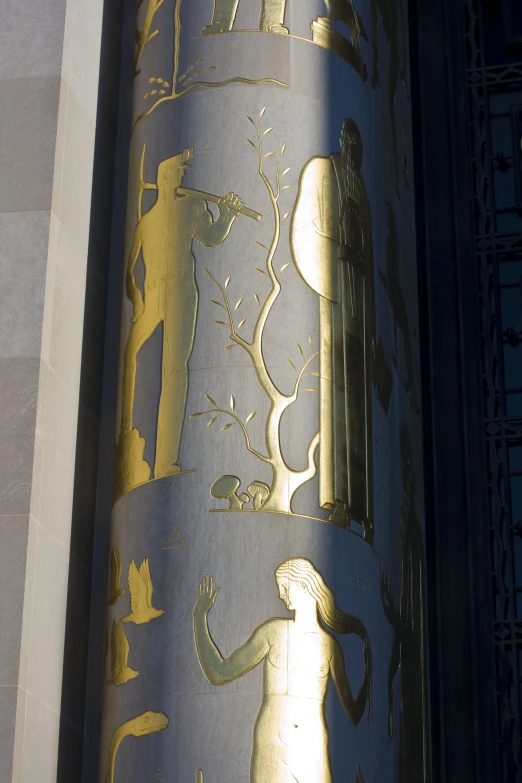 close up view of an intricately decorated gold vase