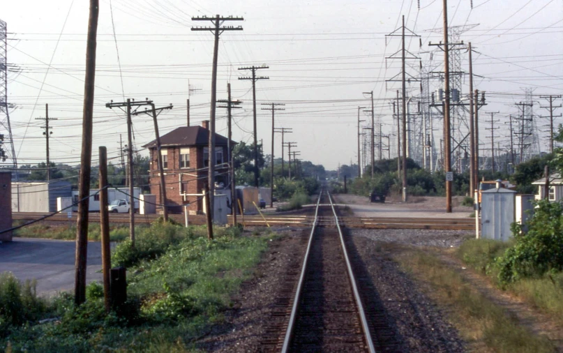 train tracks passing by buildings on top of them