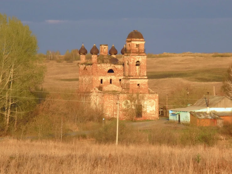 the old building has two turrets in front of it