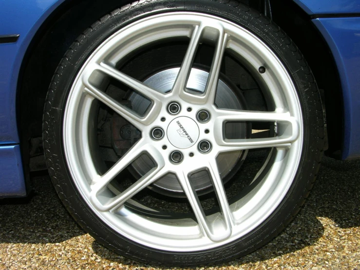a tire is shown on the rim of a car
