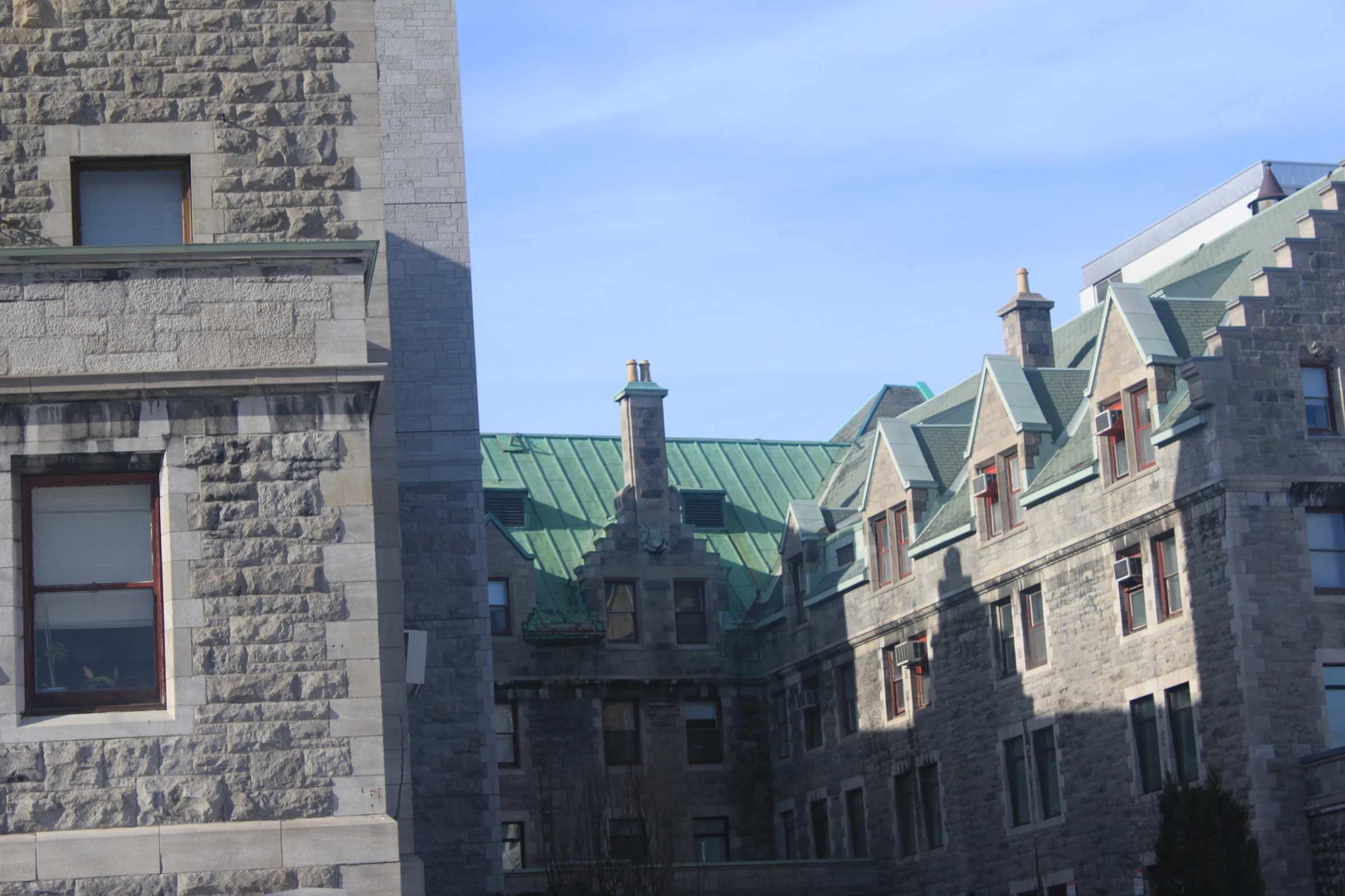 a large brick building with several chimneys