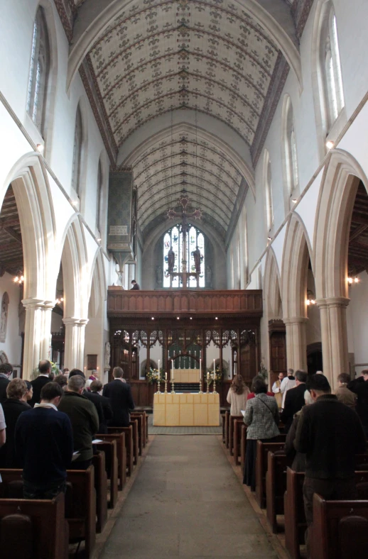 church altar filled with people during service