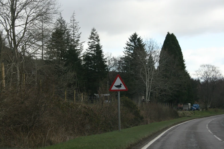 a street sign on the side of a road